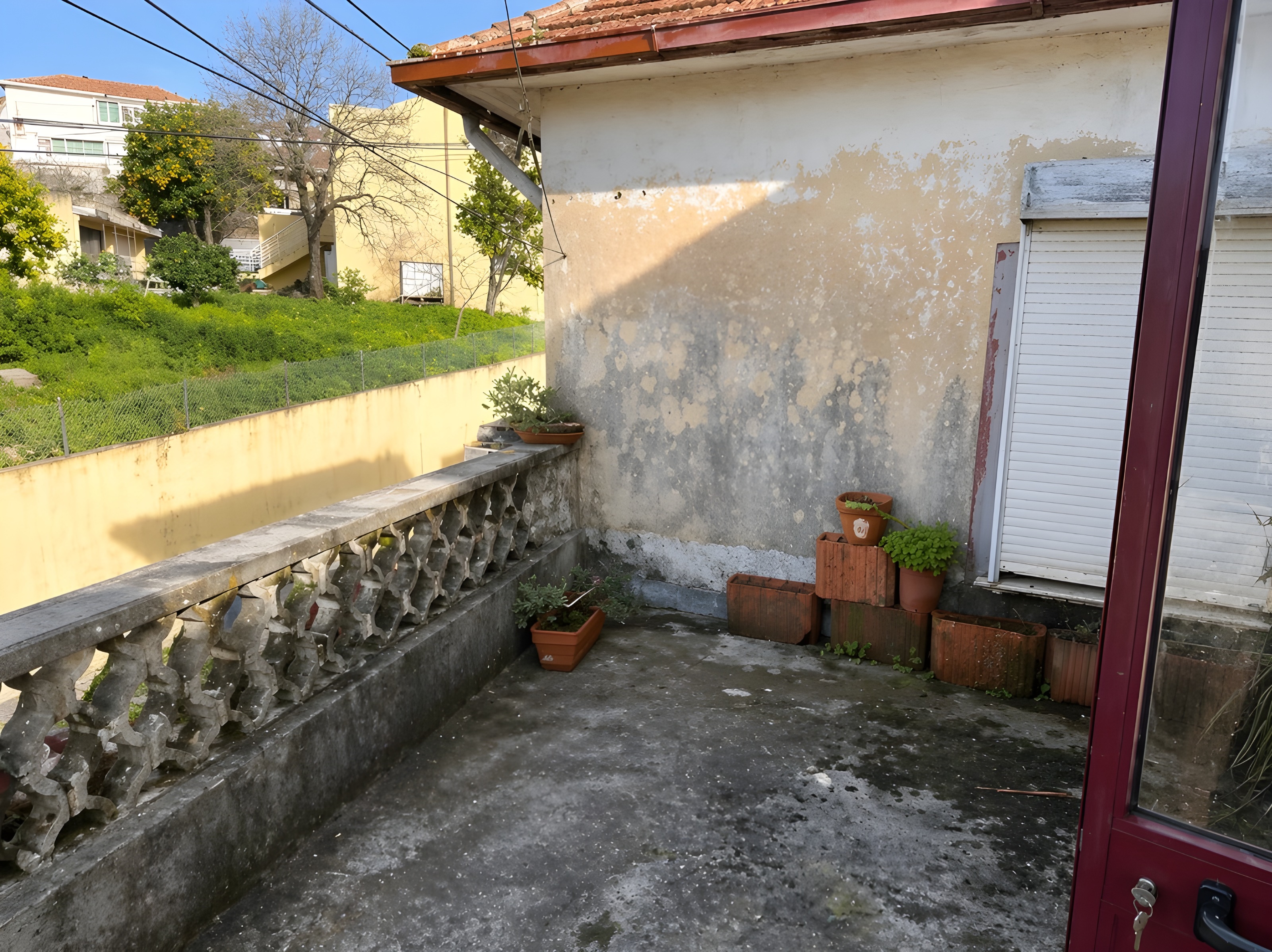 Moradia T3 para reabilitar em Perosinho com jardim e garagem — miniatura 13