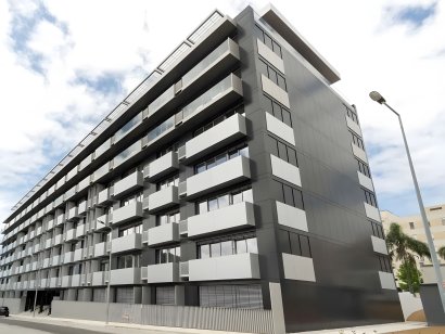 Apartamento T0 de luxo com varanda e garagem no edifício Evolution